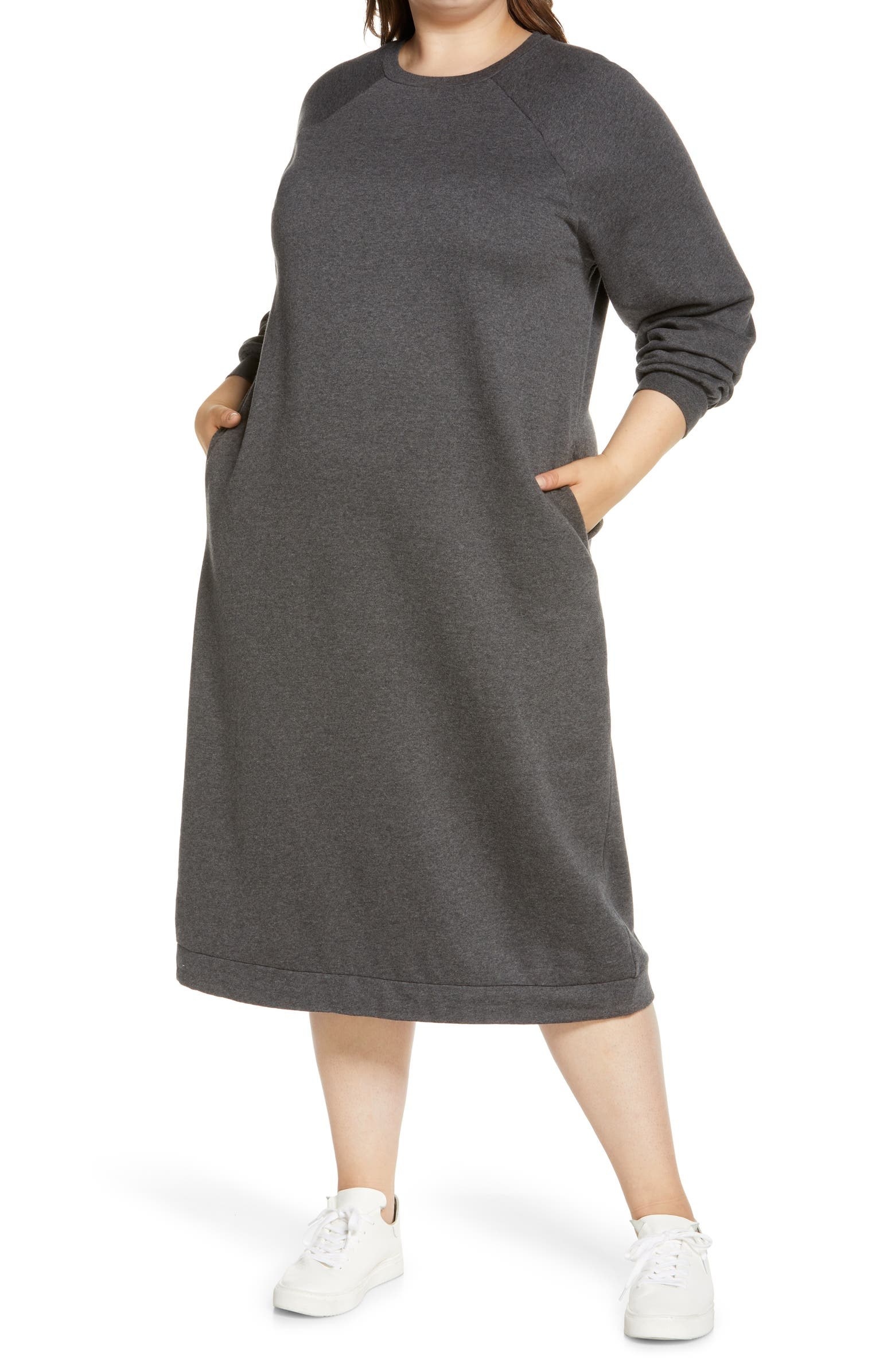 model wearing a midi sweatshirt dress that&#x27;s roomy