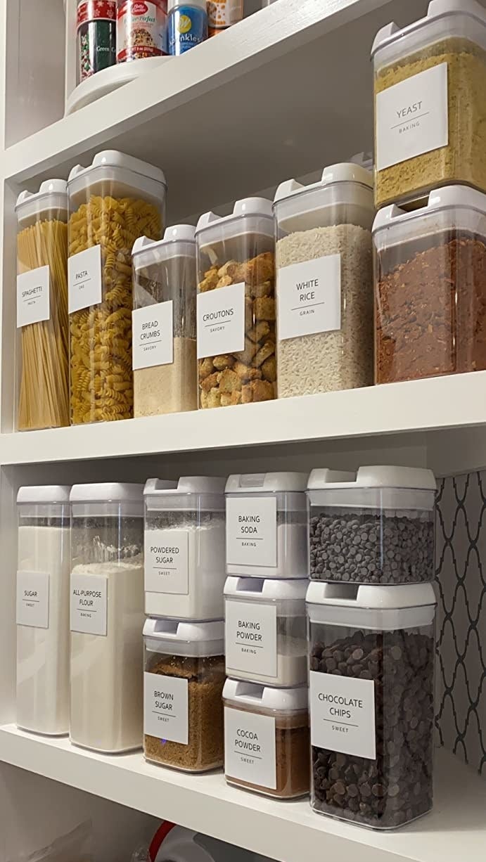 an array of containers with labels in a closet