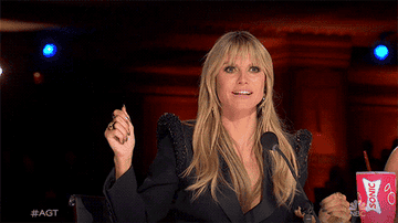 GIF of Heidi Klum with a shocked face