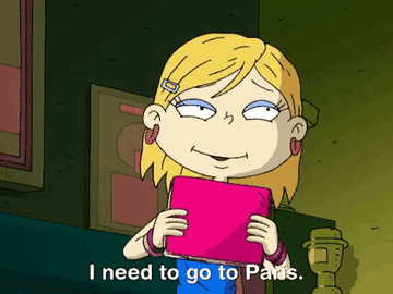 Girl holding a book saying &quot;I need to go to Paris&quot;