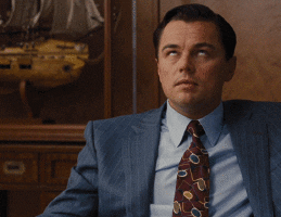 Leonardo DiCaprio bites his fist in The Wolf of Wall Street