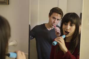 Ben Coleman and Ali Vingiano brushing their teeth in The End of Us