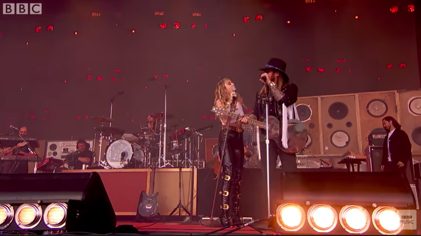 Miley and Billy performing together