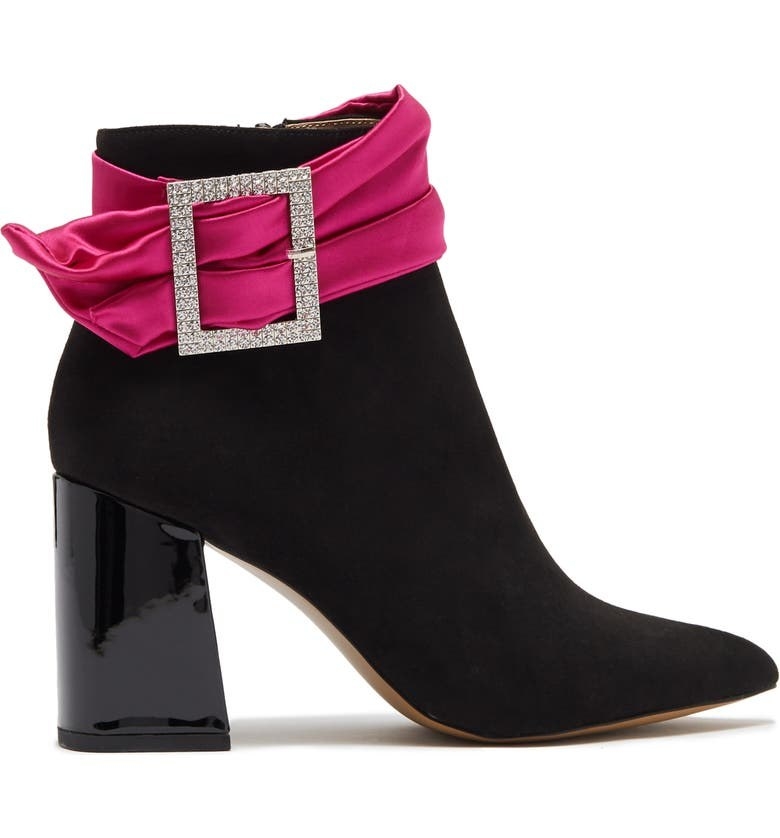 black heeled booties with pink satin ribbon and rhinestone buckle around the ankle