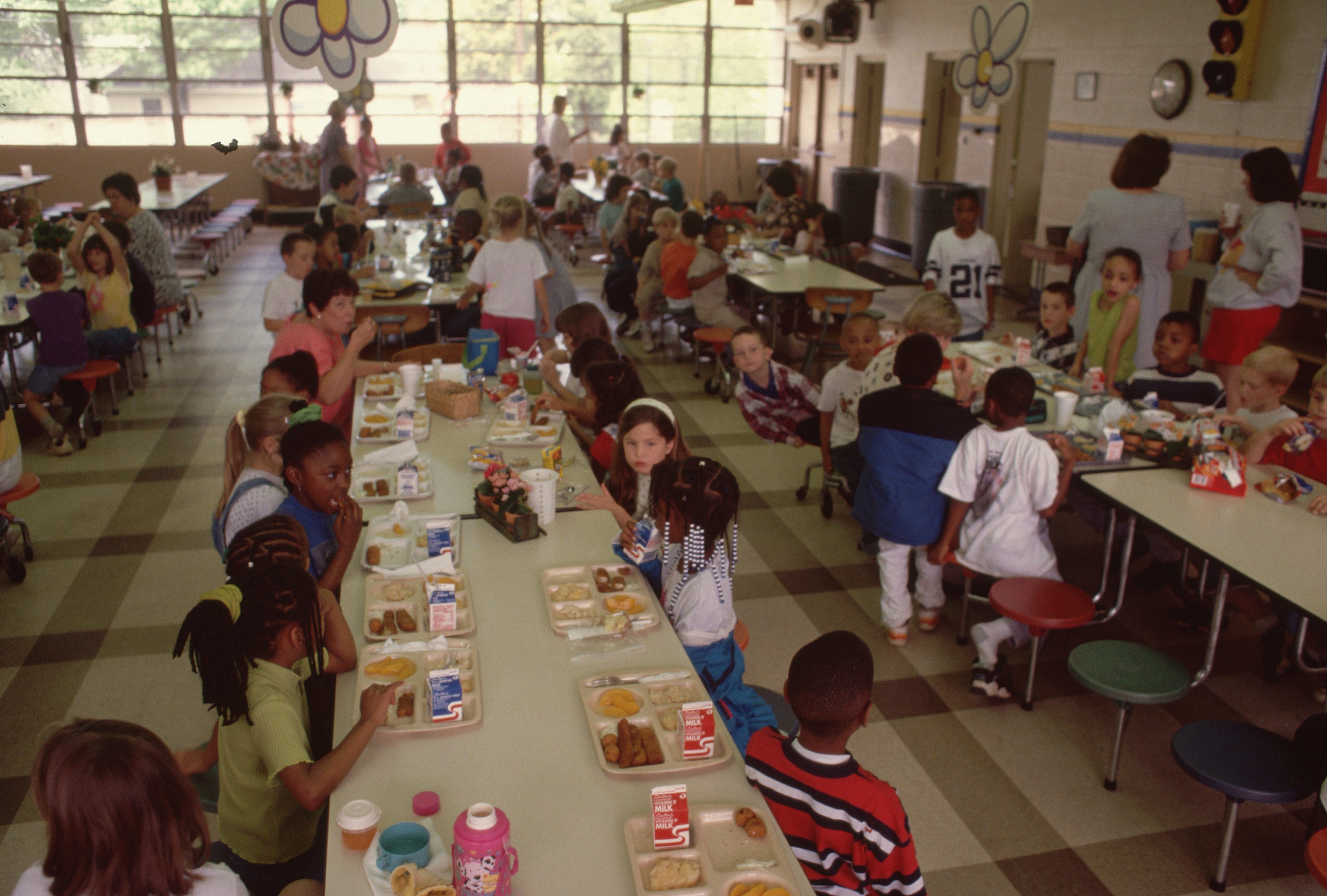 children eating in their school cafeteria