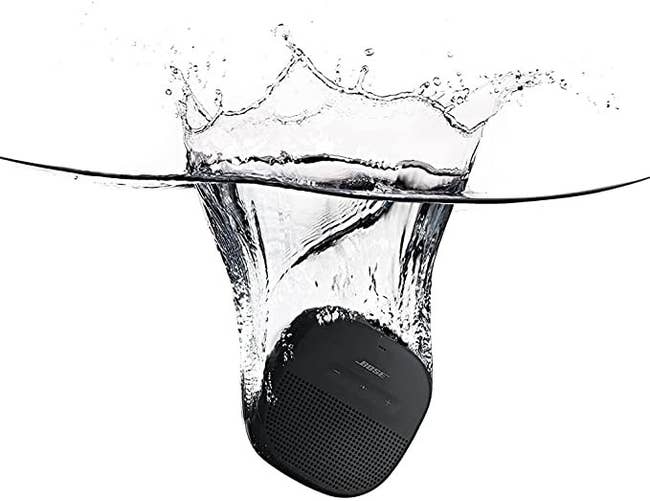 Black Bose speaker submerged in water