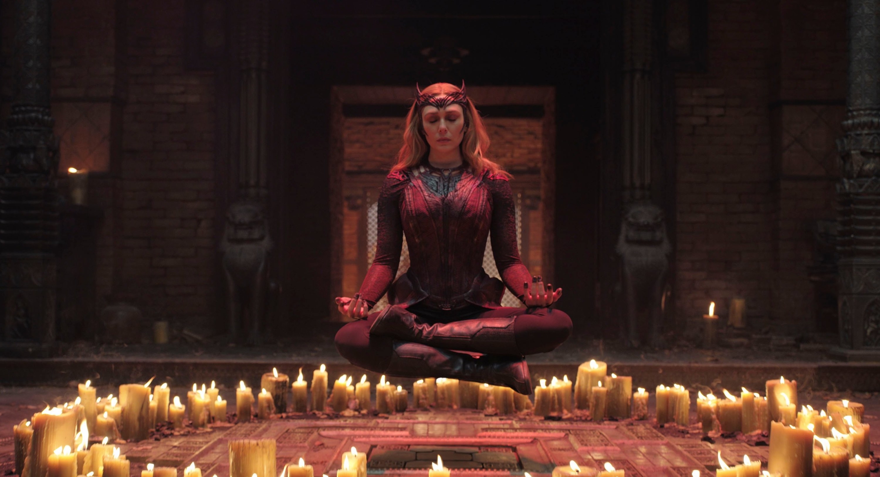 Wanda floating in a circle of candles in Doctor Strange in the Multiverse of Madness