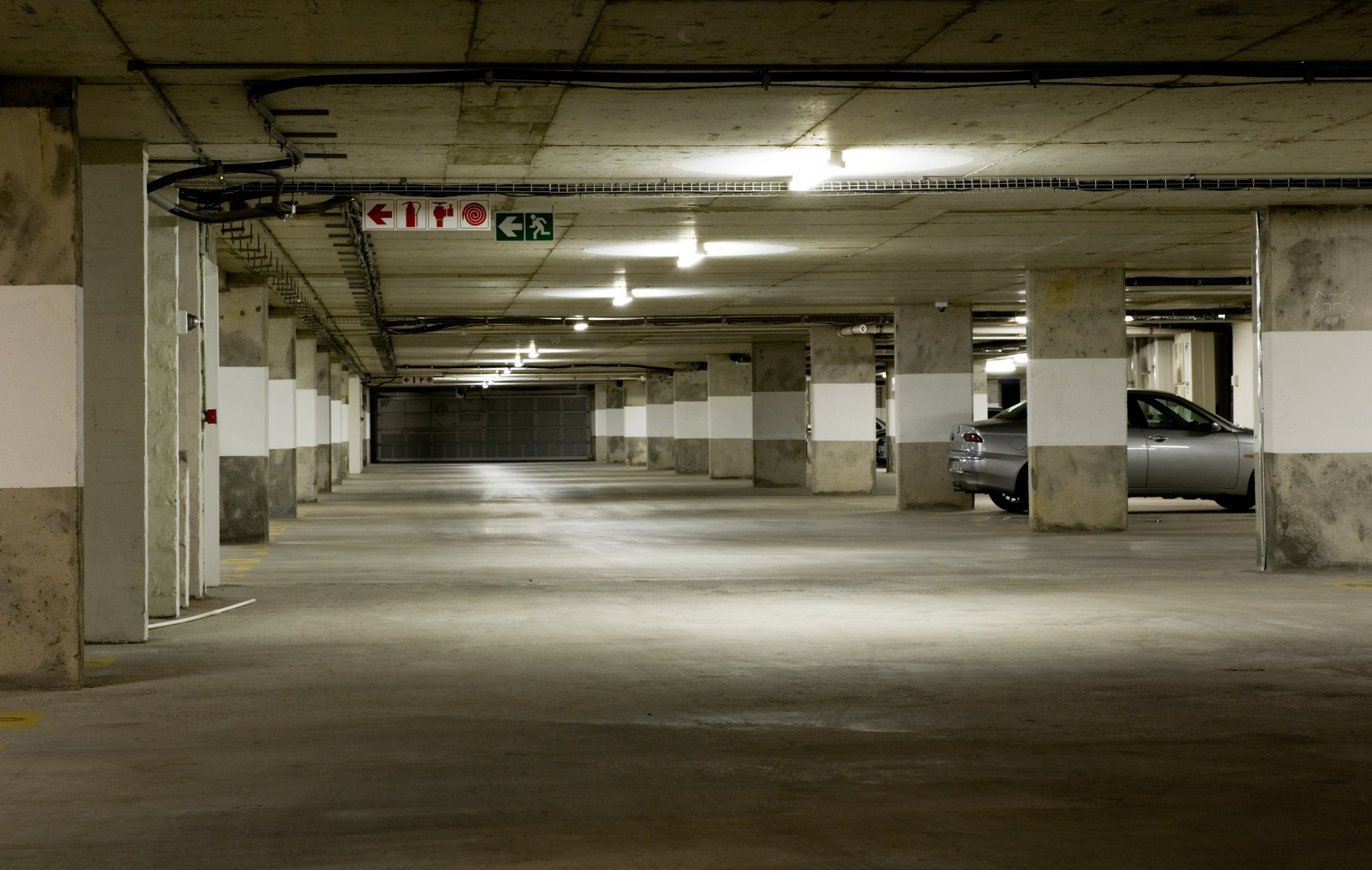 An empty, underground parking garage
