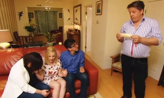 three come dine with me contestants sat on a sofa while the fourth, peter, stands reading the result