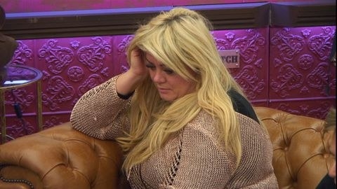 Gemma Collins sat on a sofa looking sad in the big brother house