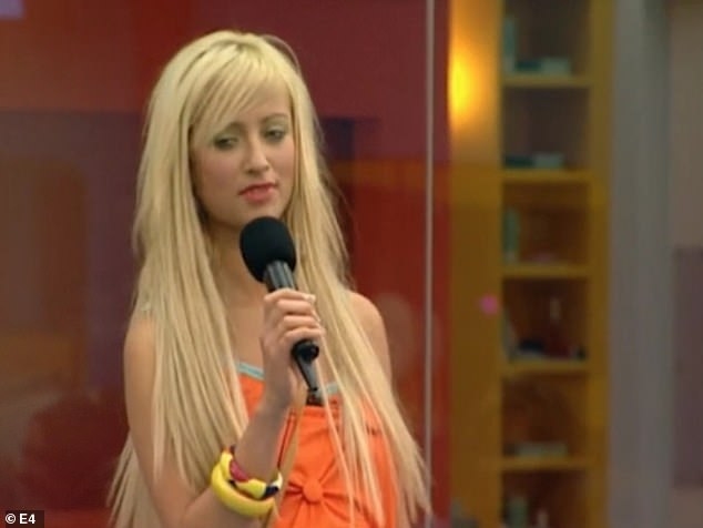 chantelle houghton stood with a microphone in the big brother house