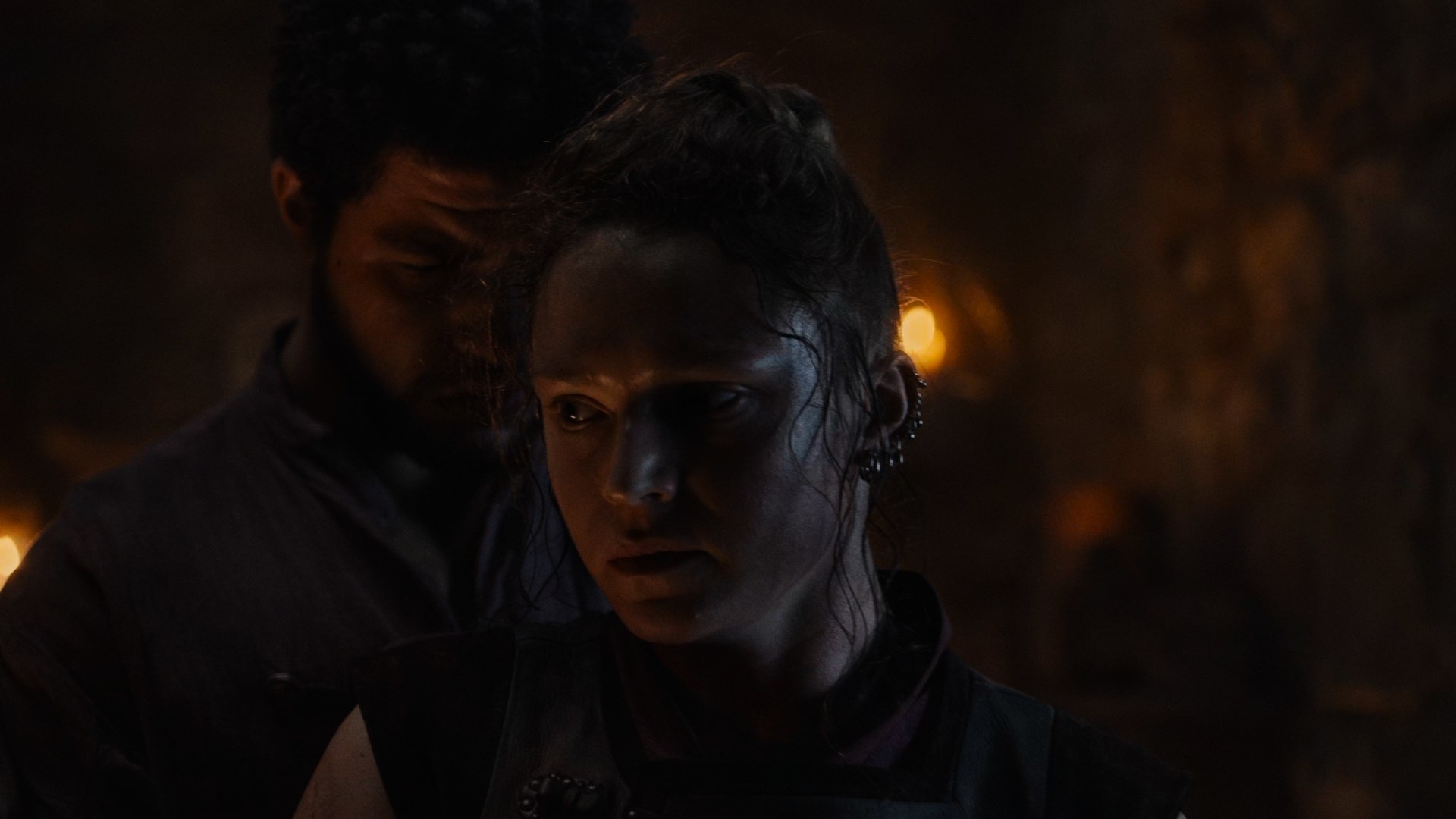 A close-up shot on Laila (Helena Westerman) and Perrin Aybara’s (Marcus Rutherford) faces in the forge – Laila, hair plastered to her head, has been working the forge and looks distracted. Perrin is resting his forehead against her head