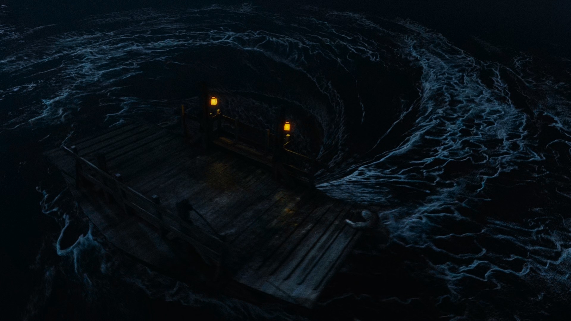 An overhead shot of a giant whirlpool, about to swallow up the Taren ferry, with the diminutive form of Master Hightower struggling to climb aboard