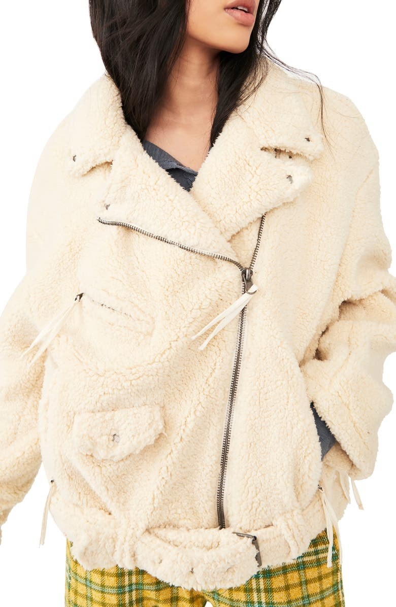A person wearing a fluffy jacket