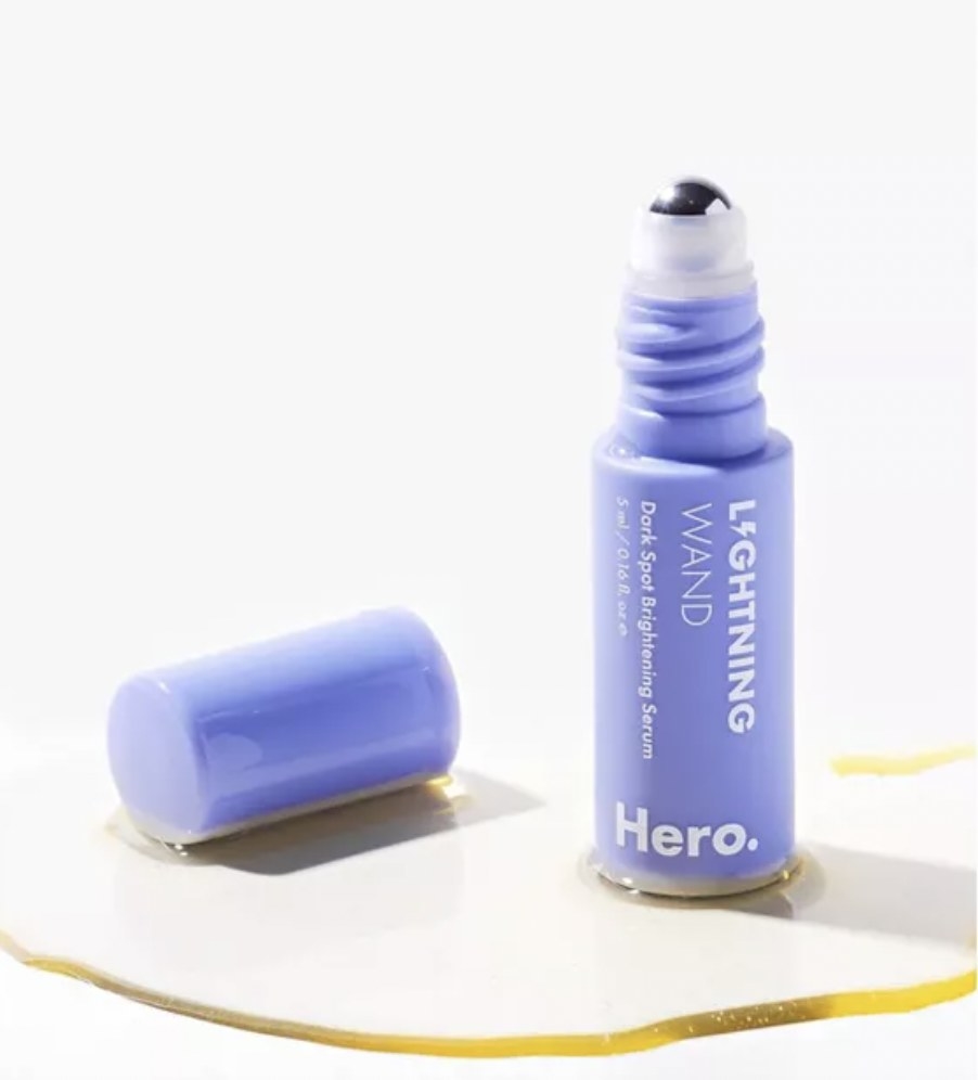 Purple Hero Cosmetics Lightening Wand with cap off with gold accent