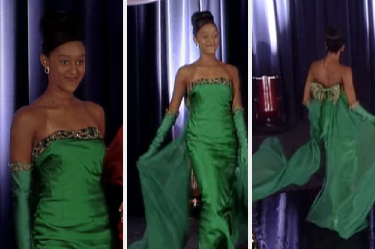 从这一事件“设计师基因,“Tia模型之一丽莎# x27; s绿色礼服一个时装表演