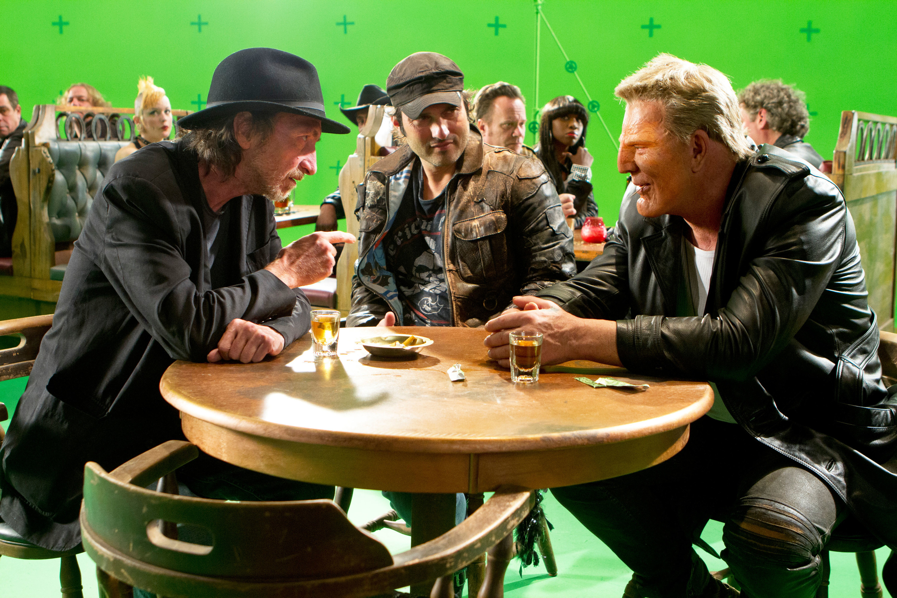 (L-R) Directors Frank Miller and Robert Rodriguez sit with star Mickey Rourke on the set of &quot;Frank Miller&#x27;s Sin City: A Dame to Kill For.&quot;