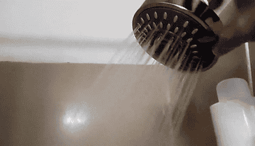 GIF of reviewer switching setting on showerhead