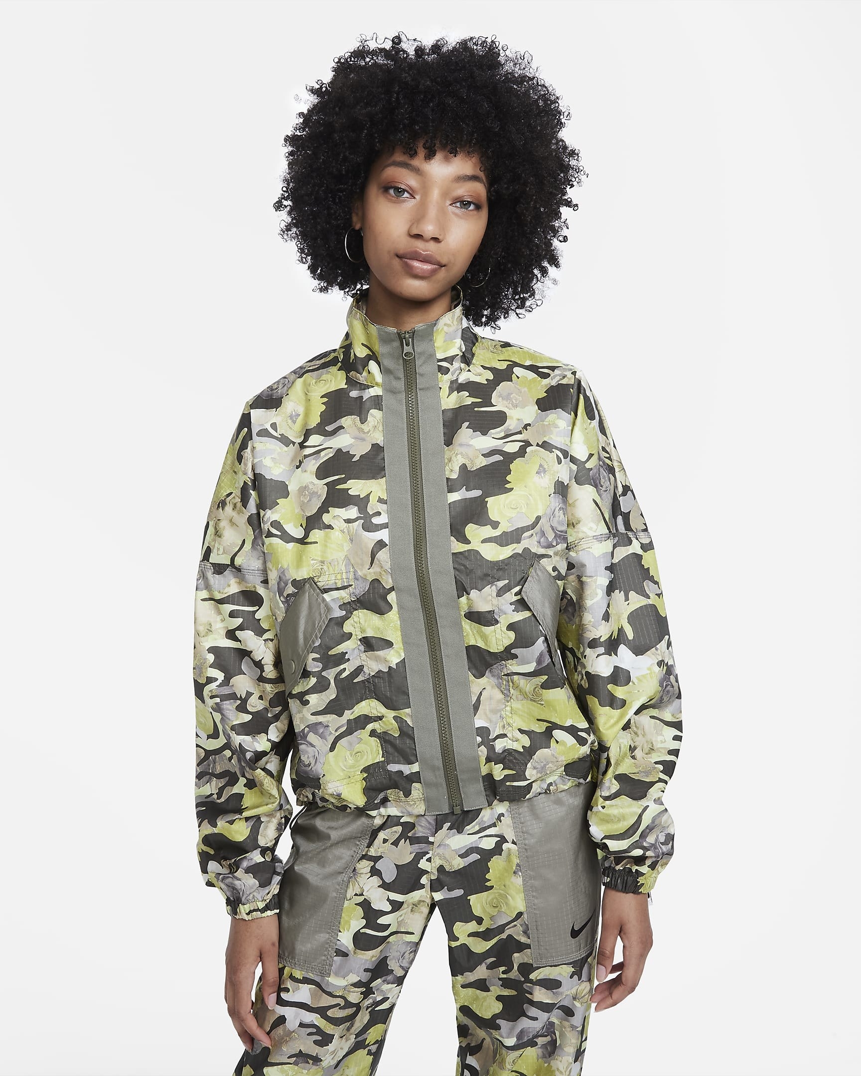 model in grey and pale green camo print zipper jacket