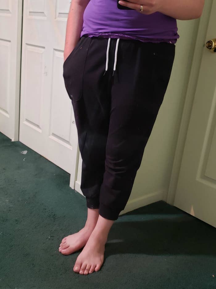 close up of reviewer wearing capri joggers