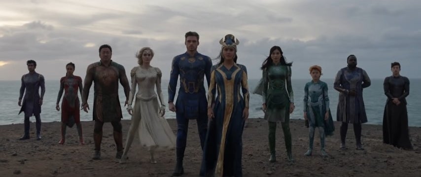 The Eternals standing together on an oceanside cliff in &quot;Eternals&quot;