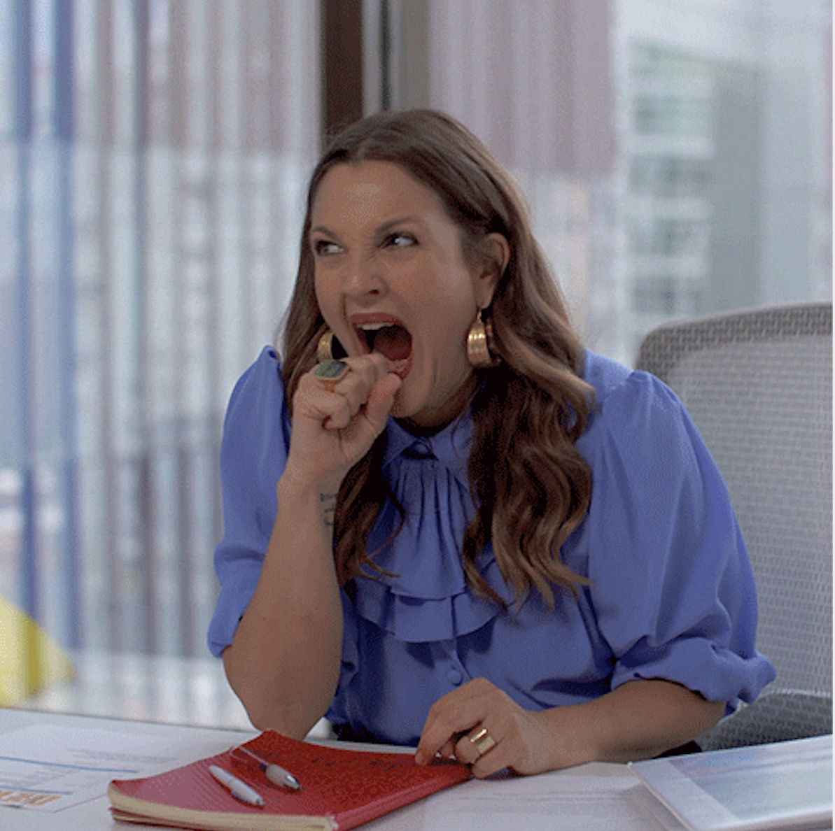 drew barrymore biting her fist in shock