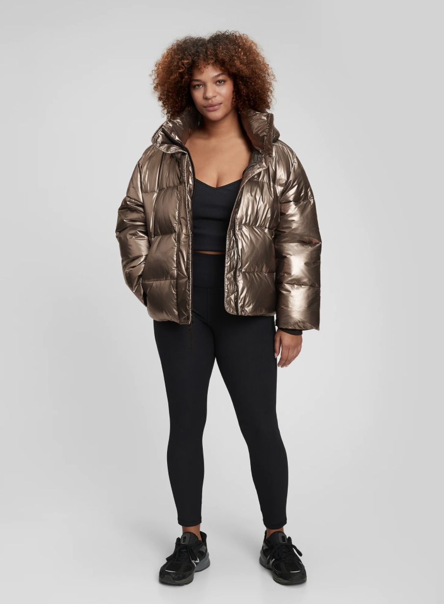 model in gold shiny cropped puffer jacket