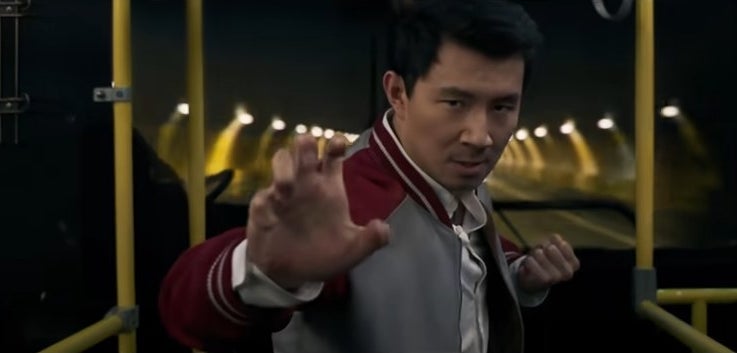 Shang-Chi in a fighting stance on a bus in &quot;Shang Chi and the Legend of the Ten Rings&quot;