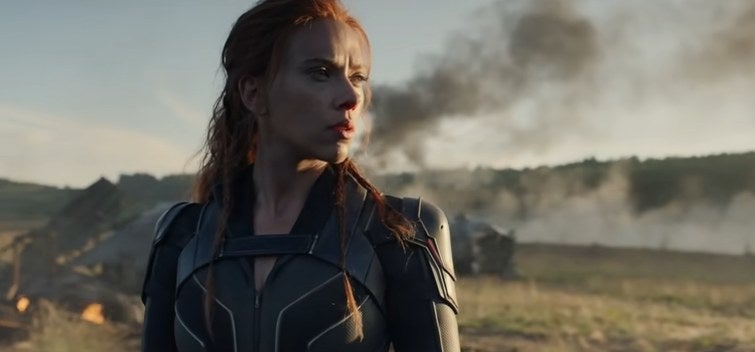 Black Widow standing in the wreckage of the Red Room in &quot;Black Widow&quot;