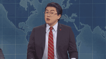 Bowen Yang saying &quot;you&#x27;re toxic&quot; in a suit on Weekend Update