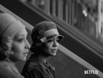 Tessa Thompson as Irene looks over at Ruth Negga as Clare in &quot;Passing&quot;