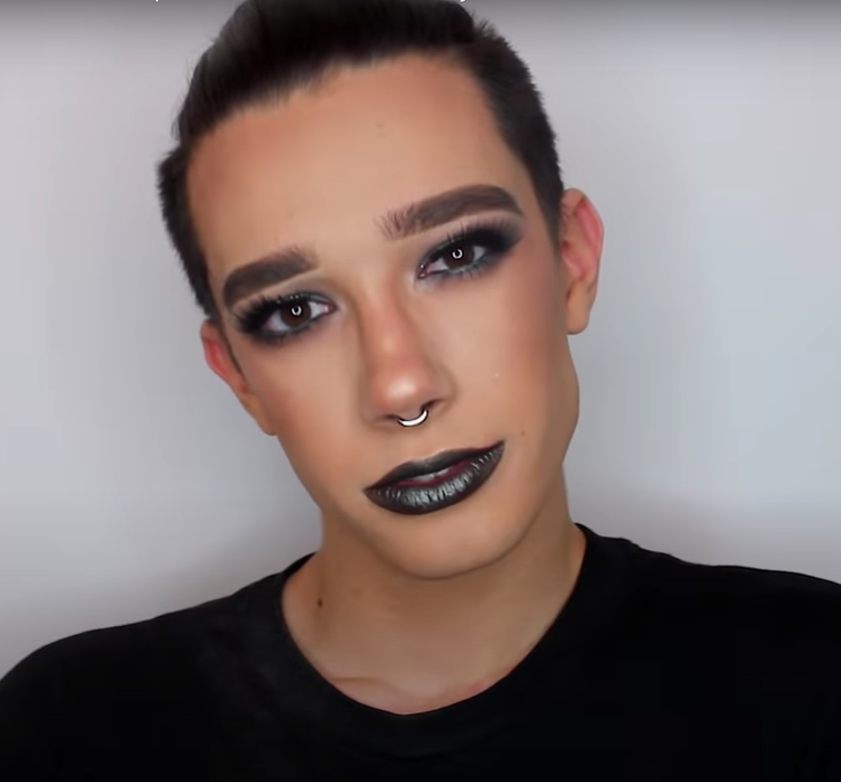 James Charles models makeup in his 2016 &quot;BLUE/BROWN SERPENT Makeup Tutorial&quot; YouTube video