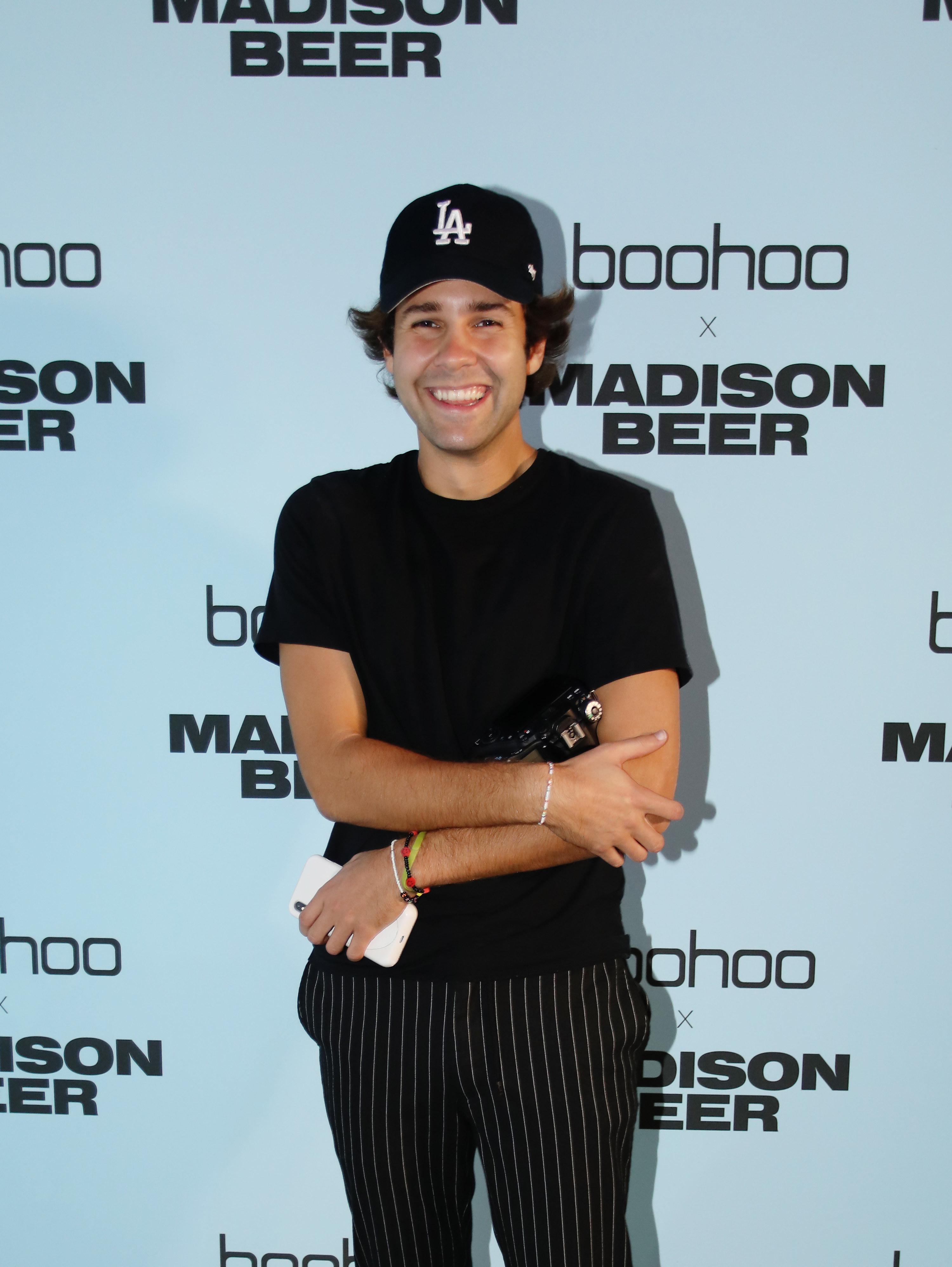 David Dobrik poses at the boohoo x Madison Beer Launch Event on August 02, 2021
