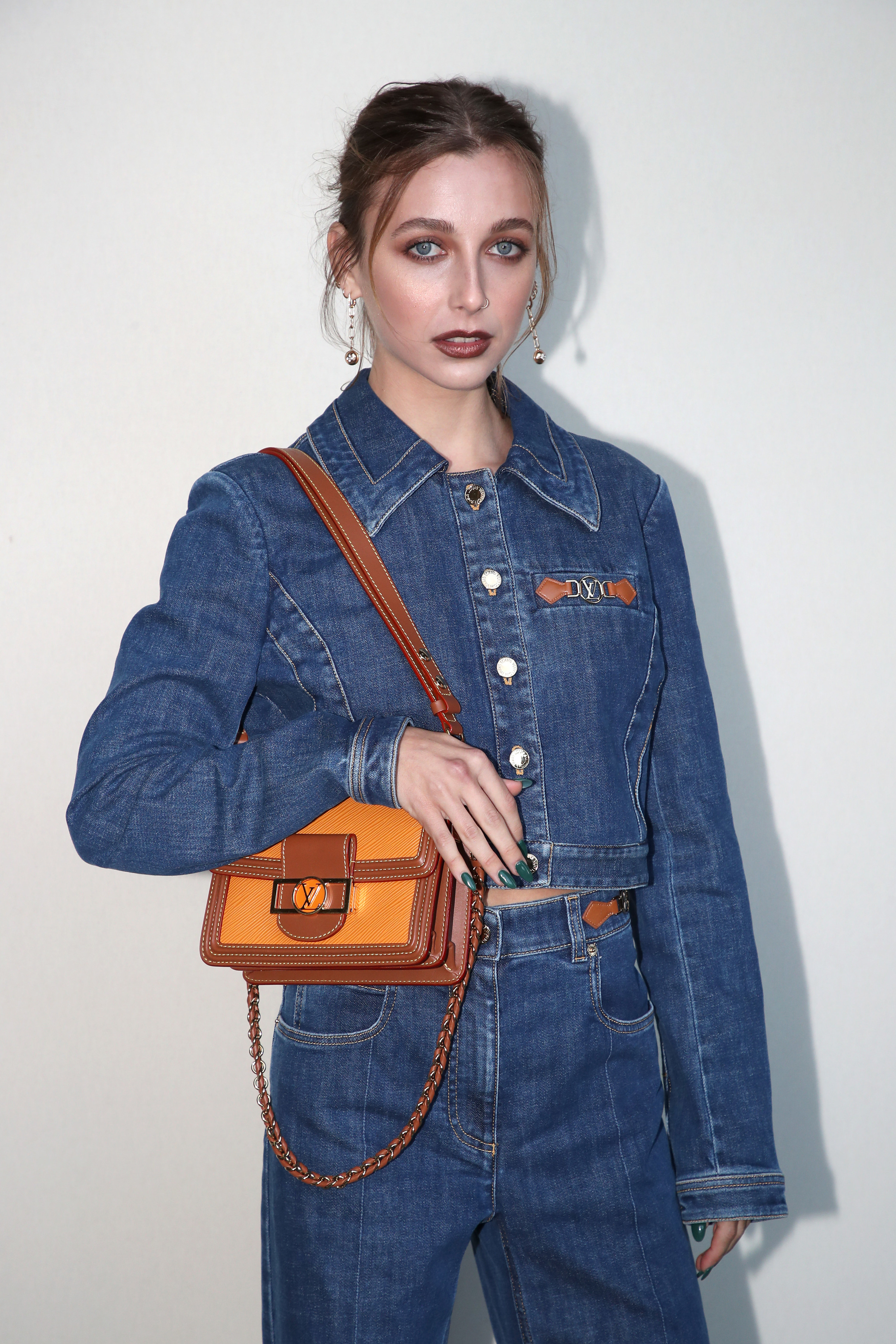 Emma Chamberlain poses at the Louis Vuitton Womenswear Spring/Summer 2022 event for Paris Fashion Week on October 05, 2021