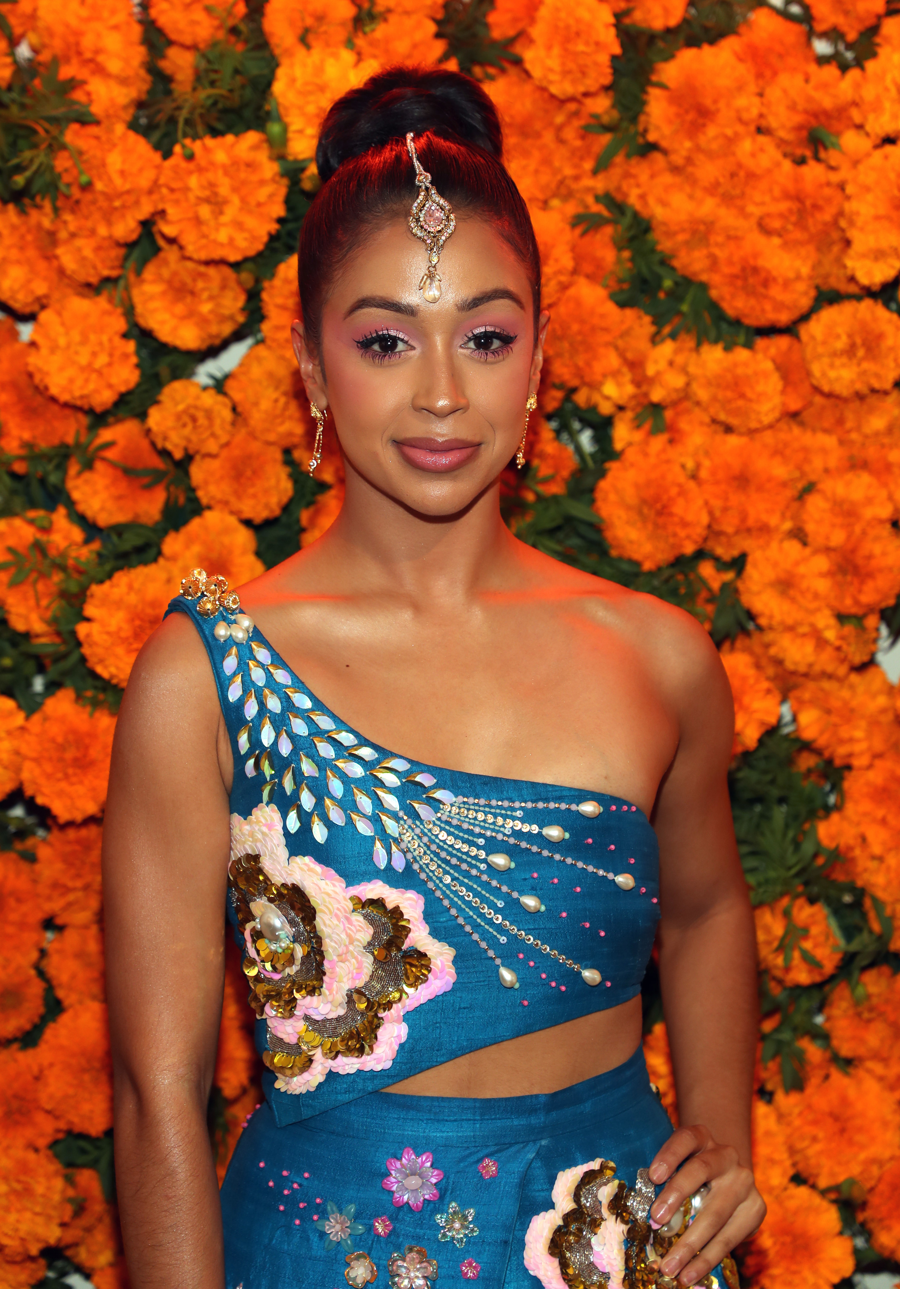 Liza Koshy poses at the Phenomenal x Live Tinted Diwali Dinner Hosted by Mindy Kaling on November 03, 2021