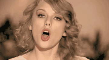 a gif of taylor swift singing in the &quot;mean&quot; music video