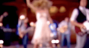 a gif of taylor swift dancing in the &quot;change&quot; music video
