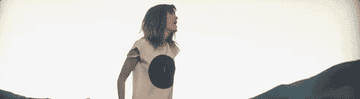a gif of taylor swift singing in the &quot;I knew you were trouble&quot; music video