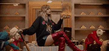 a gif of taylor swift in the &quot;look what you made me do&quot; music video