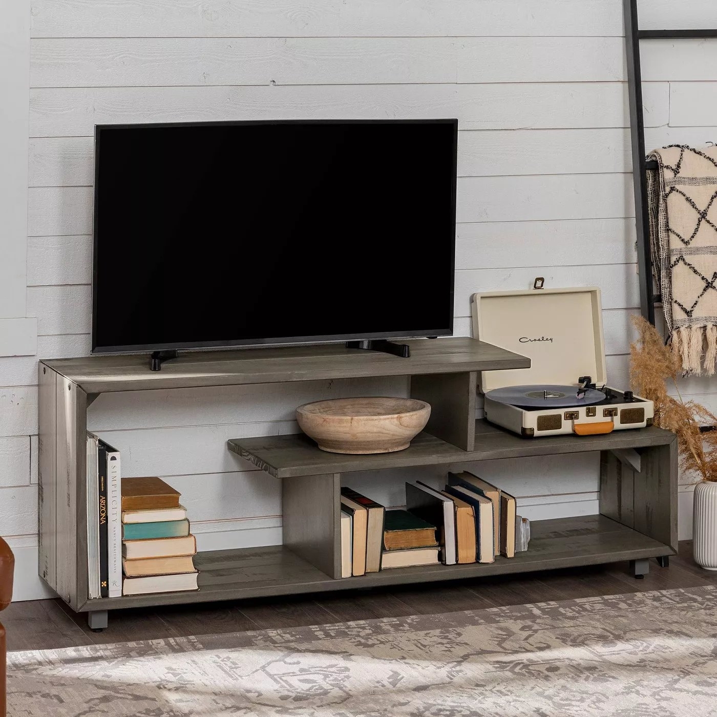 The TV stand in a gray wash