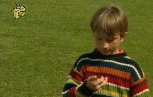 bernard looking down at his stopwatch