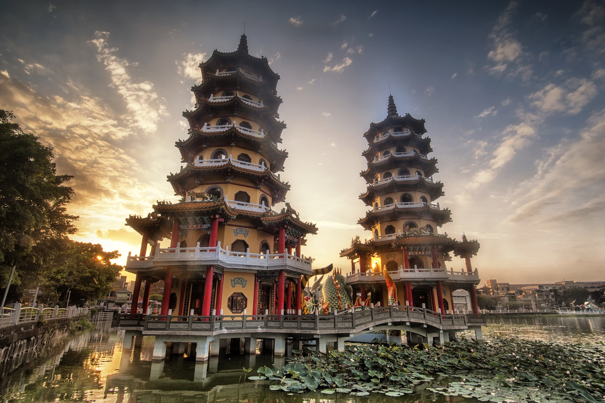Two pagodas over a pond.