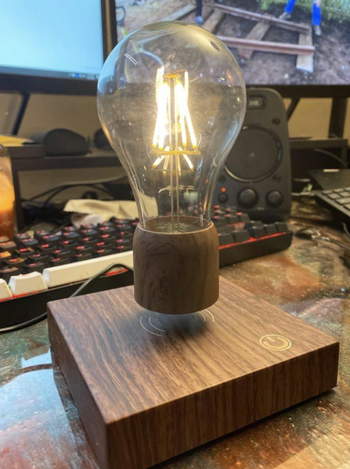 reviewer pic of the levitating lamp