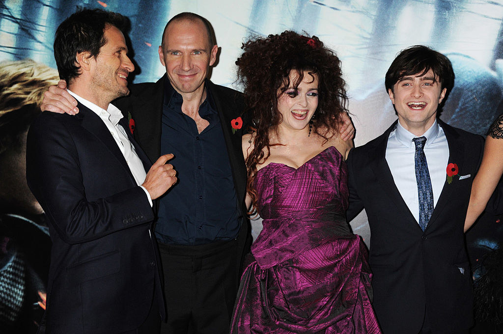 The cast of Harry Potter laughing at the red carpet premiere