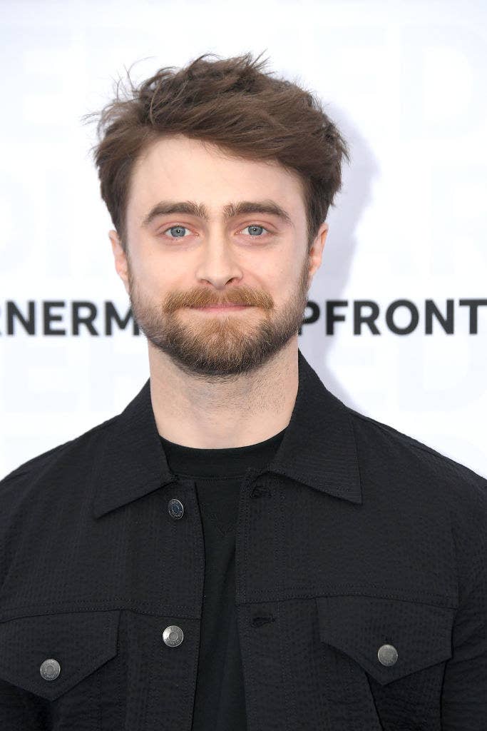 Daniel Radcliffe posing for photographers at a red carpet event
