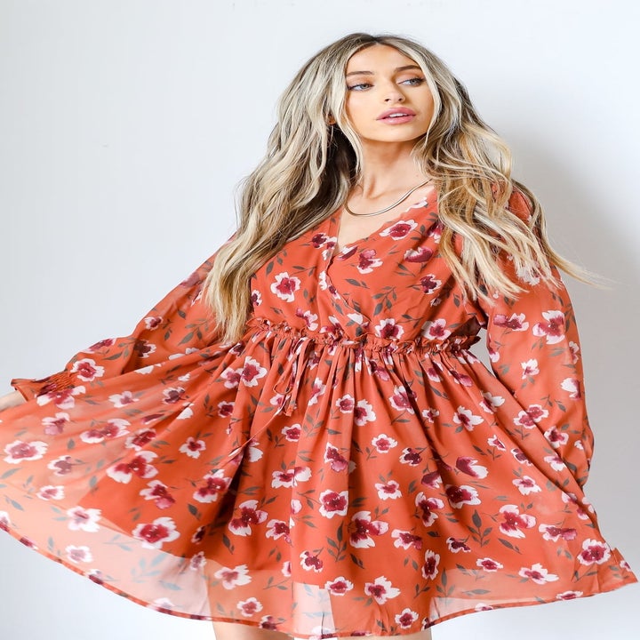 Model wearing floral dress