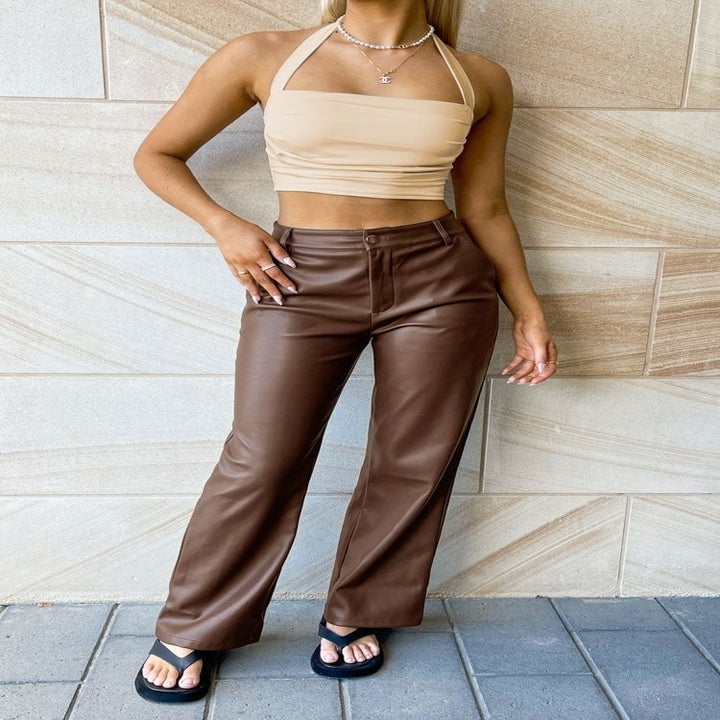 Model wearing brown pants
