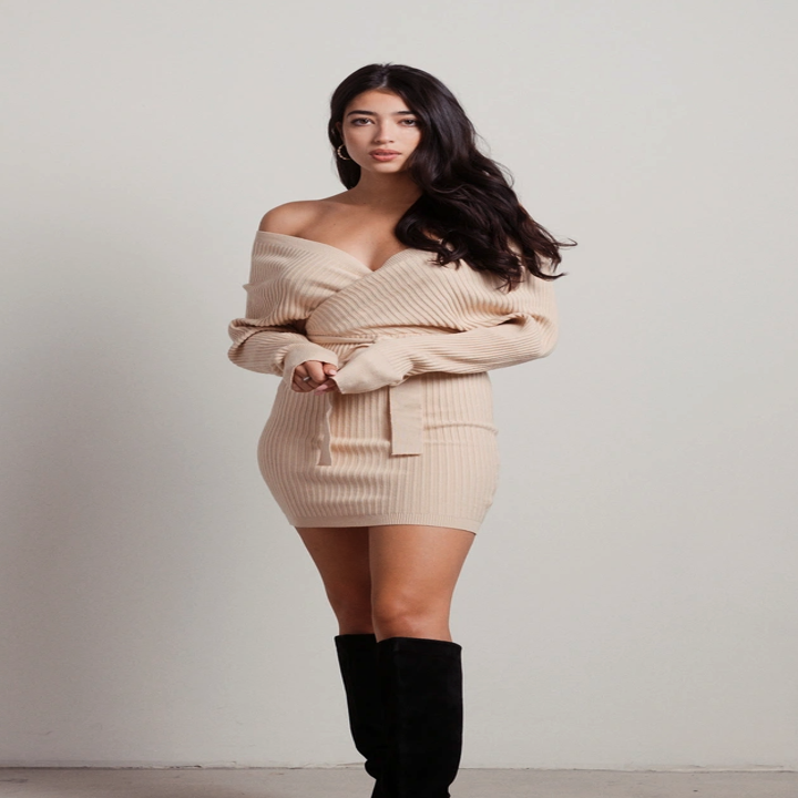 Model wearing beige sweater dress