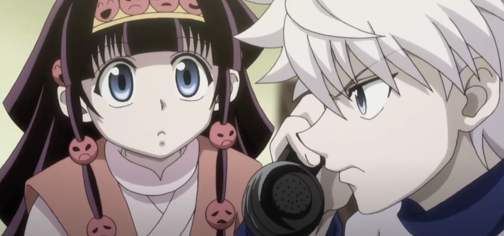Alluka blankly stares at brother while he&#x27;s on the phone