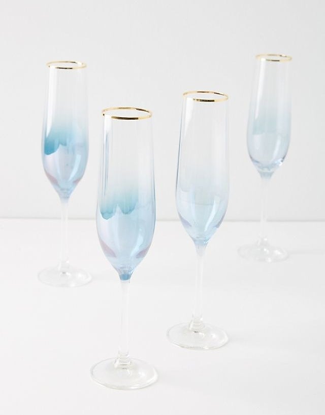 Four blue champagne flutes